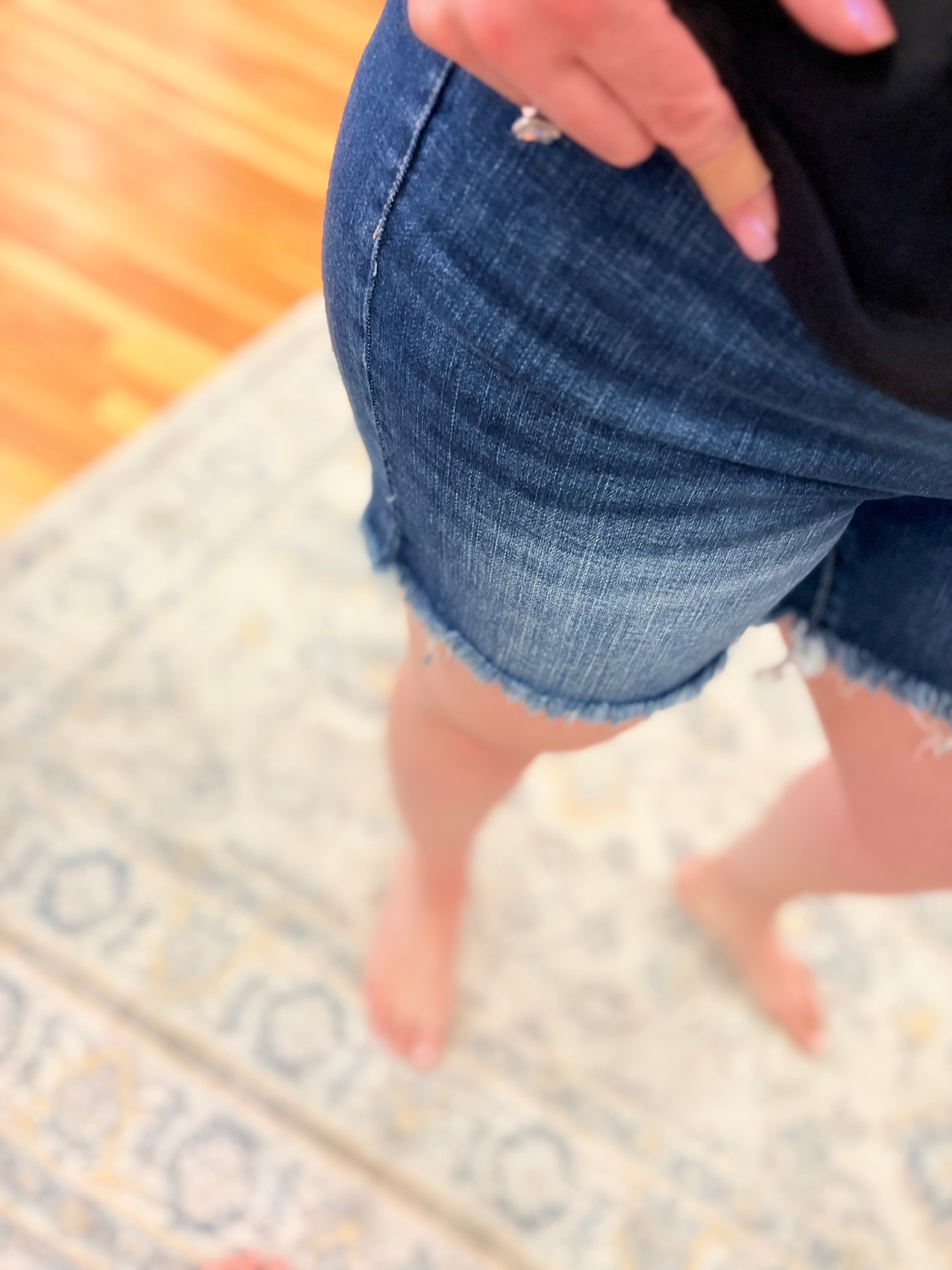 Mid Rise Raw Hem Denim Shorts